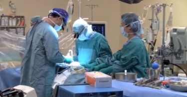 Surgeons performing a surgery