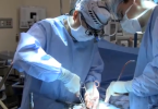 Surgeon performing prostate cancer surgery