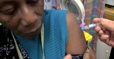 Woman getting flu shot