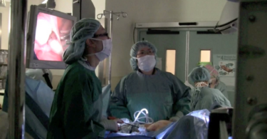 Doctors performing minimally invasive surgery