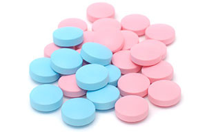 Blue and pink pills