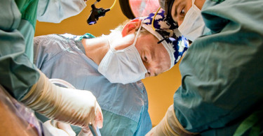 Surgeons performing surgery