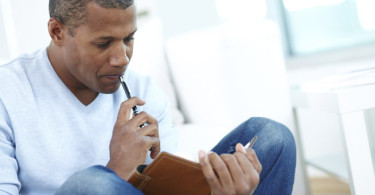 Man reading journal