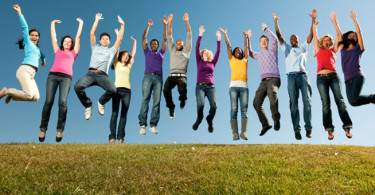 Happy group of people jumping