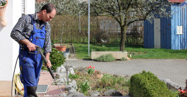 Man cleaning the porch in the spring