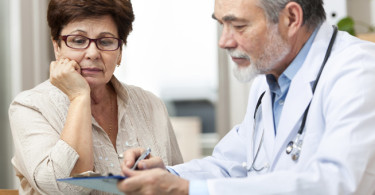 Doctor speaking with patient