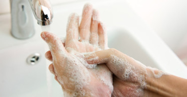 person washing hands