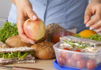 Woman packing a healthy lunch