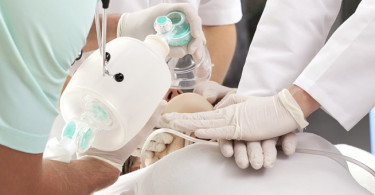 Doctors performing CPR on patient