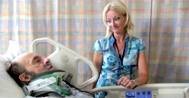 Nurse and patient in ICU who used electrolarynx