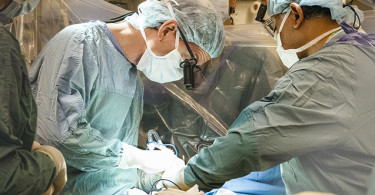 Surgeon performing heart surgery