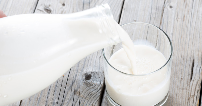 pouring a glass of milk