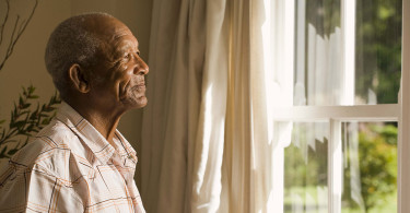 Man looking out of the window