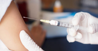 Person receiving flu shot