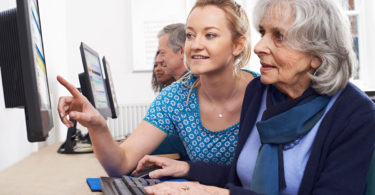 Senior using a computer