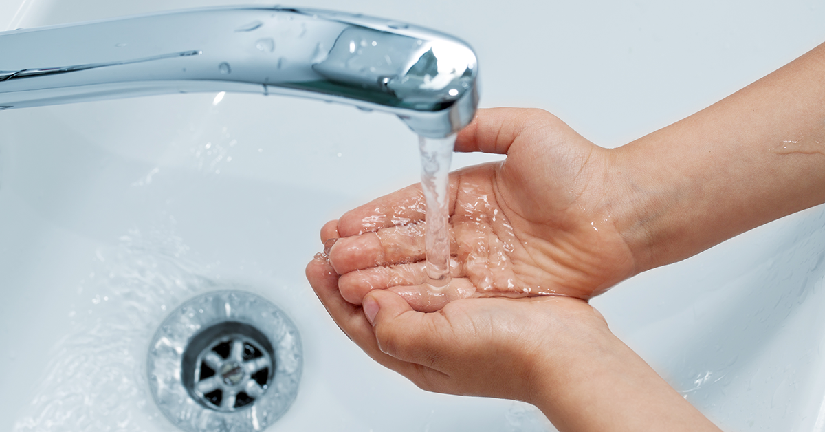 Person washing hands