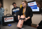 Participants at a Stop the Bleed course, which teaches first responders how to deal with uncontrolled bleeding in trauma victims.