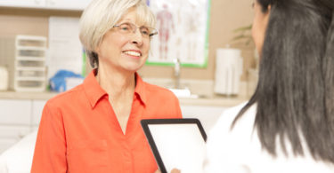 woman talking with doctor