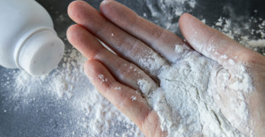 Talcum powder on hands