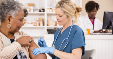 older adult getting a vaccine