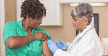 Women receiving vaccine