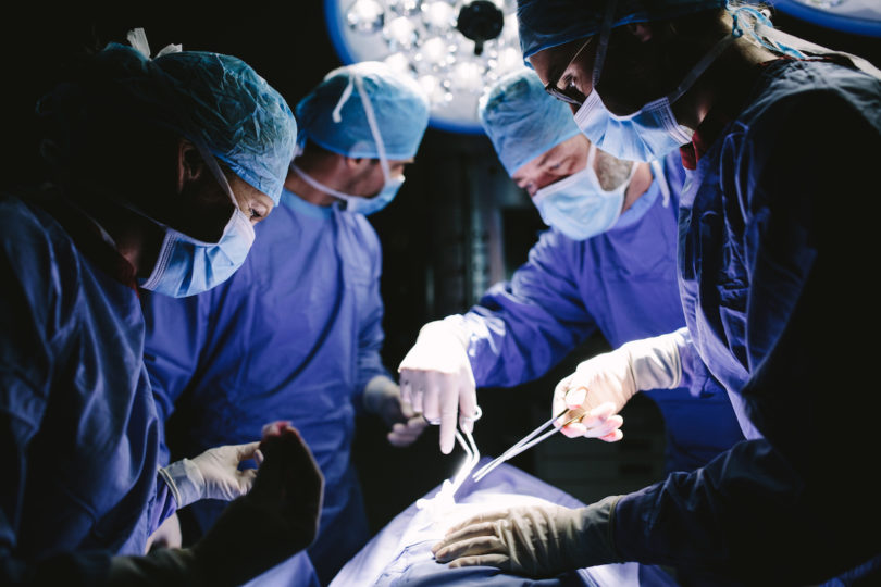 surgeons in operating room