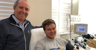Richard and Patrick Carl donate plasma.
