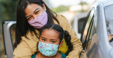 mom and daughter wearing face masks