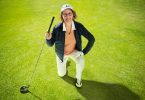Bev Moir and her golf club