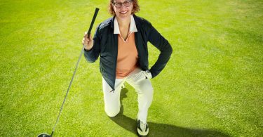 Bev Moir and her golf club