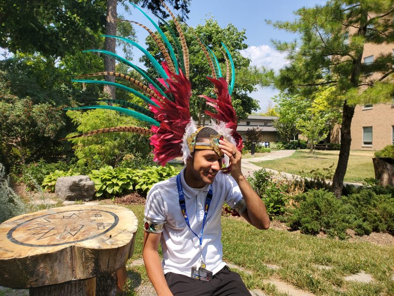 Aaron Hope wearing carnival headpiece