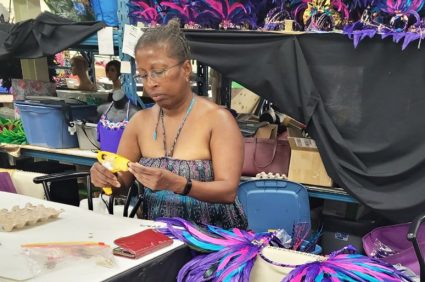 Anne Marie Phillips constructing costumes