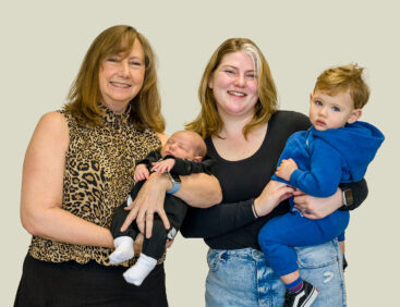 Dr. Karen Fleming (left) with patient Jade Allison (center) and her children.