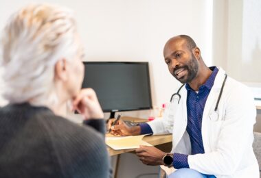 A doctor talks to a patient